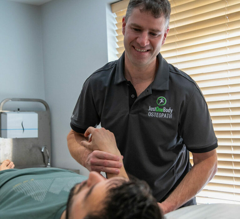 Sports and deep tissue massage on a patient’s back at Just One Body in New Ross