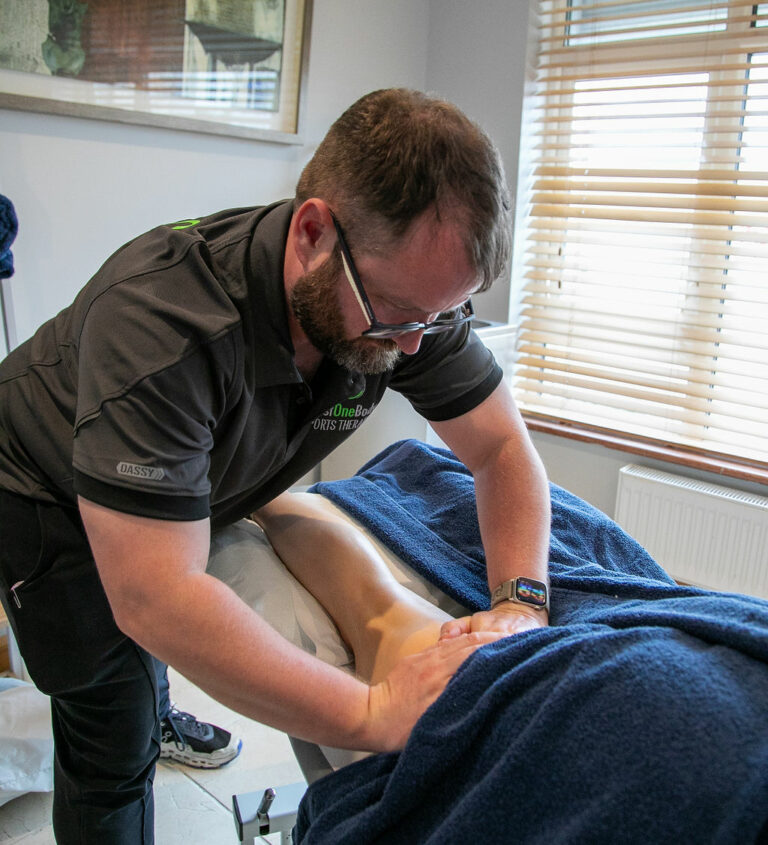 Brian O'Shea giving a sports massage at Just One Body